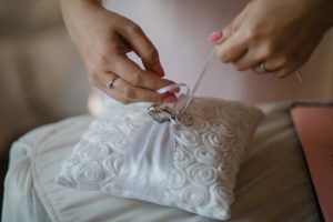 Bride decorating a small pillow