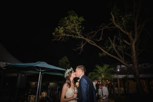Newlyweds kissing each other