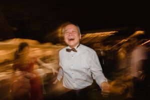 Father of the groom having fun at the party