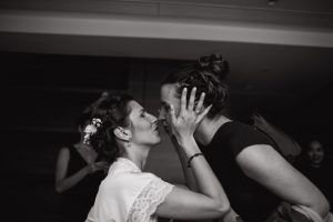 Bride kissing her best friend
