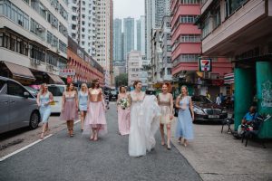 Bride with his maids walking down the streets