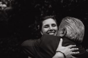Father hugging his soon to be married daughter