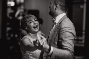 Newlywed couple having a good time dancing