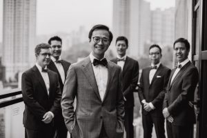 Groom posing with his friends