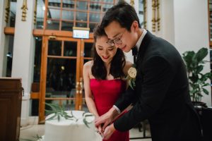 Beautiful couple cutting the cake