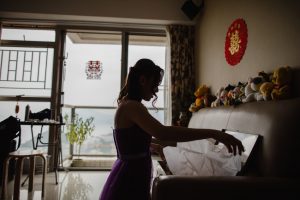 Newlywed bride opening up gifts