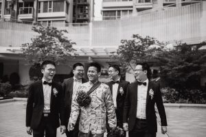 Groom with his friends walking towards the venue