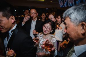 Guests having drinks at the reception party
