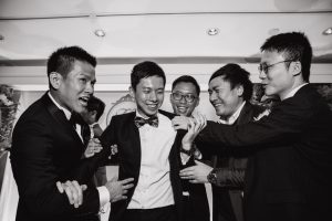 Groom getting teased by his friends