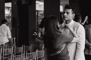Husband getting buttoned up by the wife