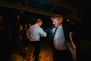 guys dancing at wedding